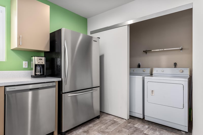 Laundry room next to the kitchen