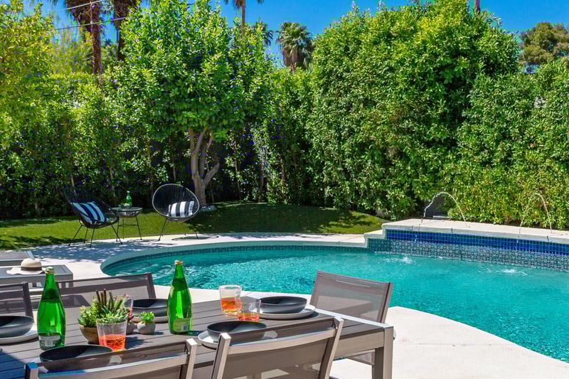 Enjoy a cocktail while relaxing poolside