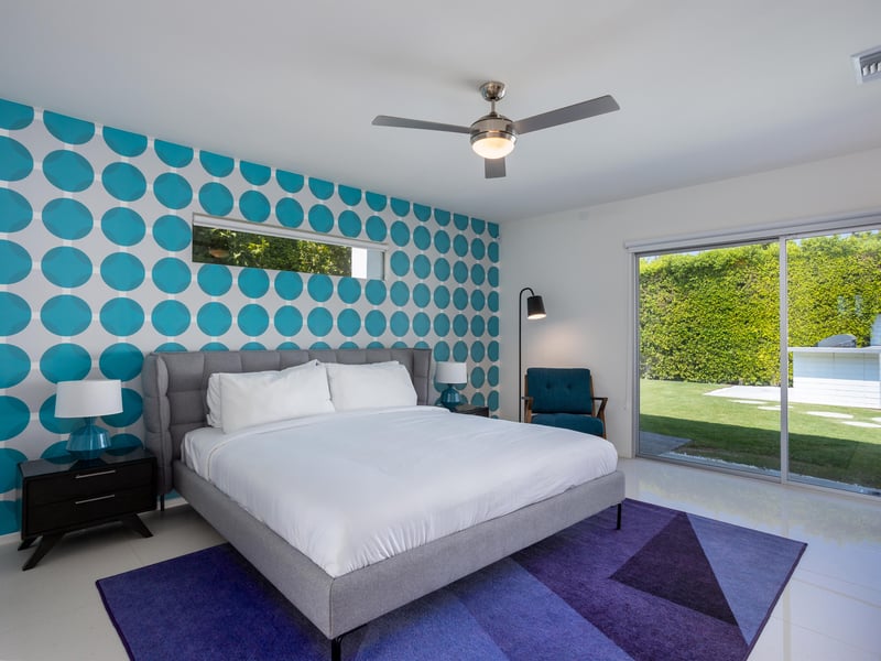 Pops of color in the bedrooms create that fun Palm Springs vibe