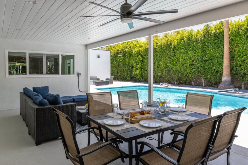 Covered Al Fresco dining for 6 with multiple lounge spaces