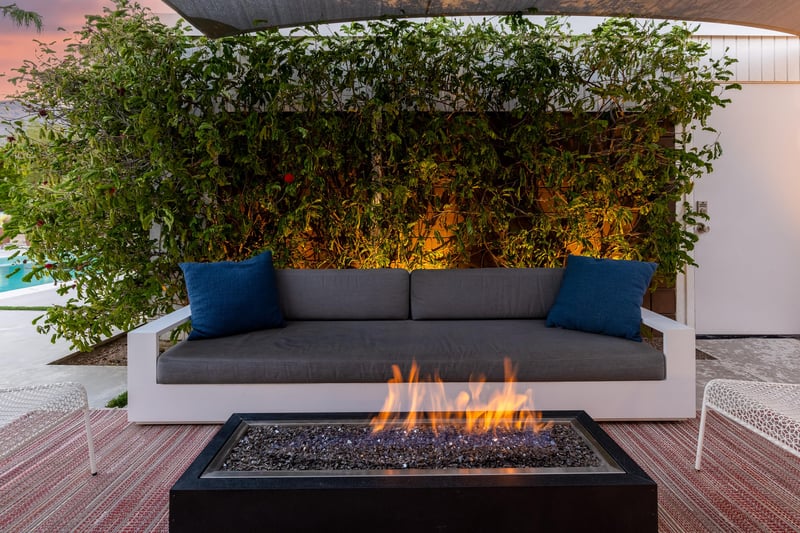 Sit around the firepit with a glass of wine