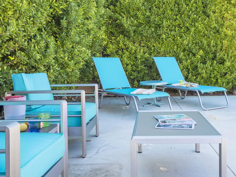 Enjoy a cocktail while relaxing poolside