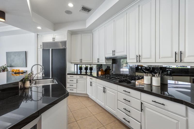 Clean white cabinetry with all the amenities you need