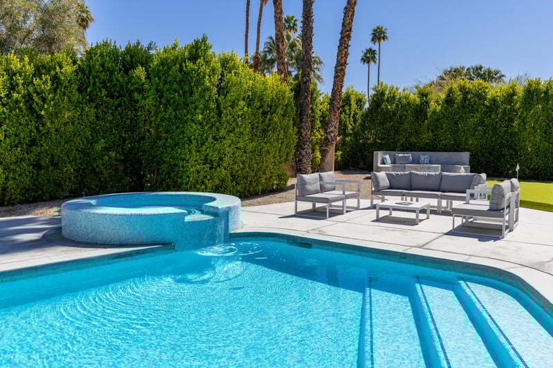 Amazing waterfall spa into the gorgeous step in pool