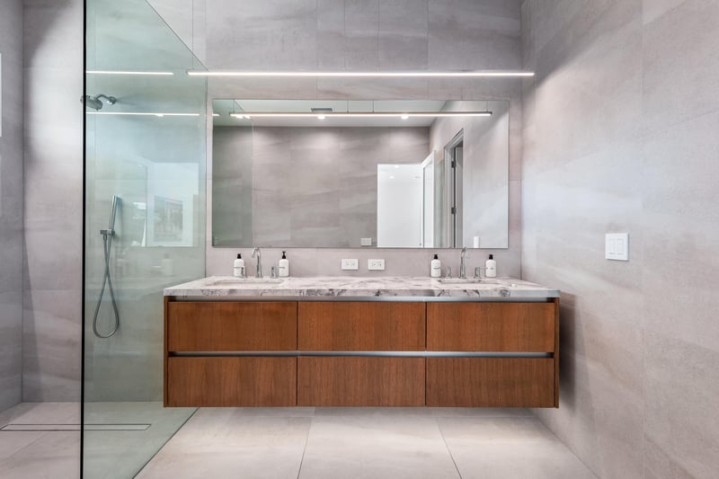 Dual sink vanity in this huge guest bathroom