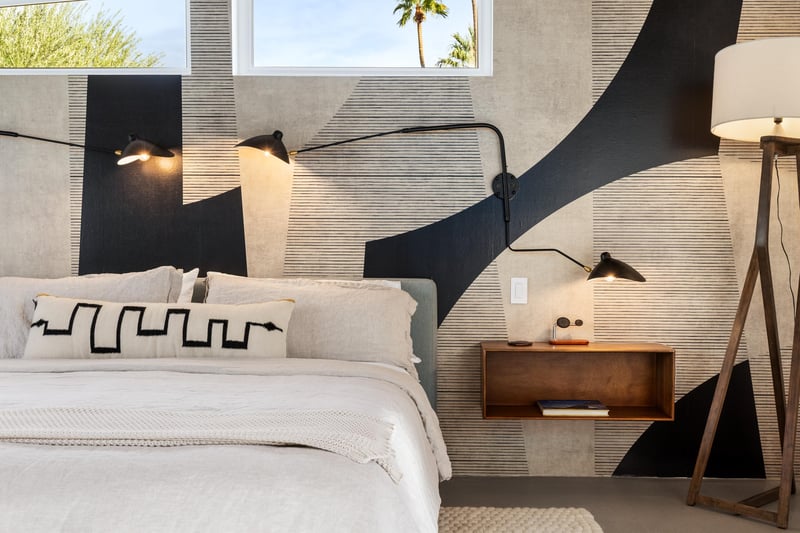 Rest in your stylish bedroom with crisp linens, warm lighting, and modern design touches creating the perfect retreat.