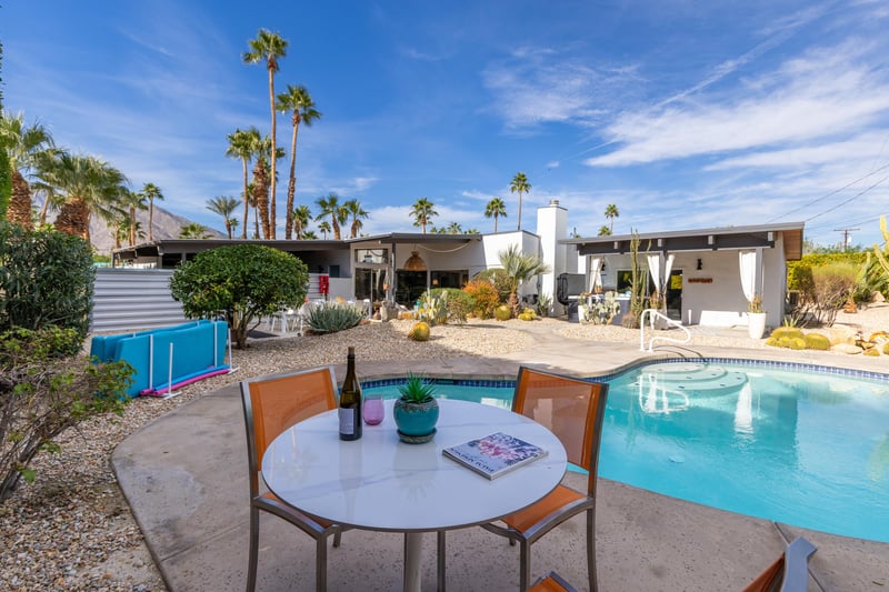 Sip your morning coffee poolside at this stylish desert retreat, where modern architecture meets Palm Springs sunshine.
