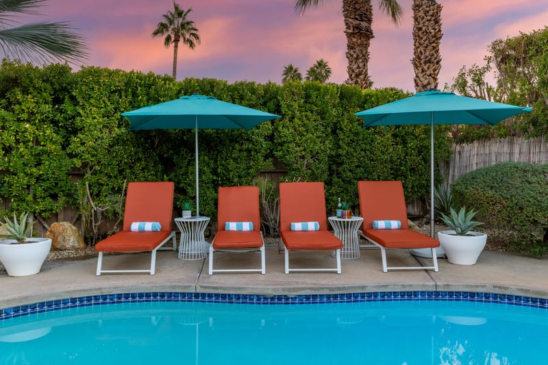 Relax on comfortable lounge chairs by your private pool as the desert sky paints a magical sunset overhead.