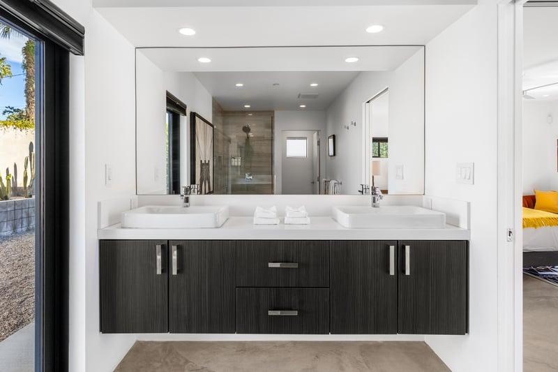 Primary bathroom with dual vanities