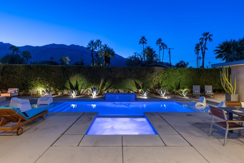 Mountain backdrop and desert landscaping
