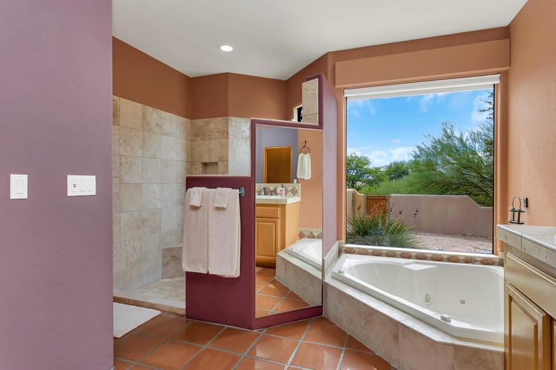 jetted garden tub with beautiful views in the master bathroom