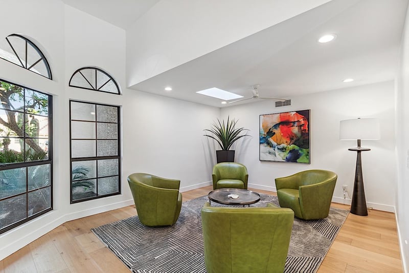Entryway sitting room that gets tons of natural light