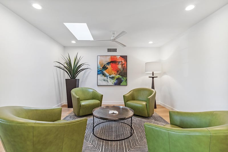 Entryway sitting room that gets tons of natural light