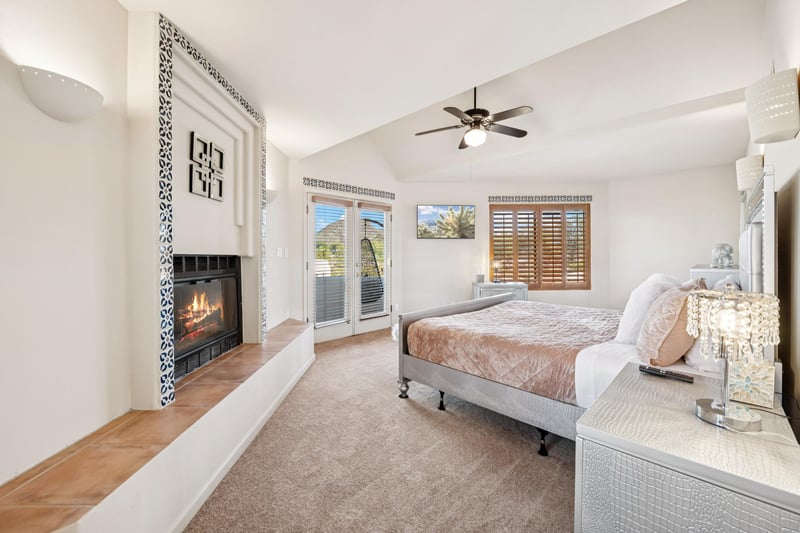 Upstairs primary bedroom with king size bed.