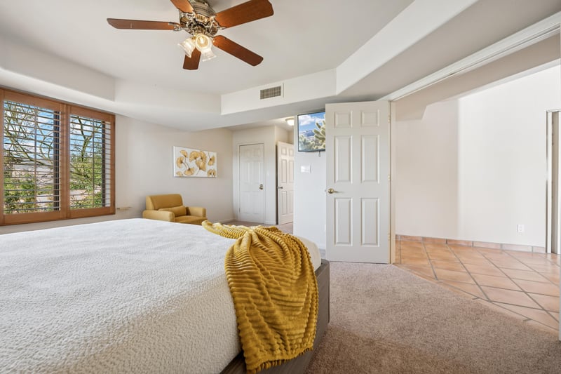 Downstairs guest bedroom with king side bed.