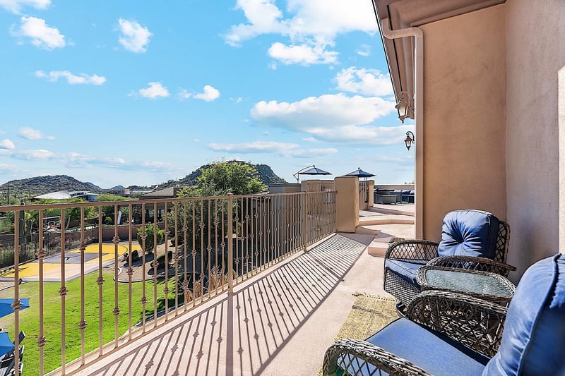 Second Bedroom  East Facing Patio Access w Sitting chairs