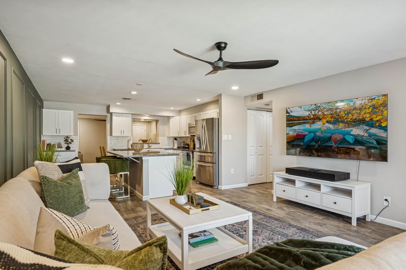 Large flat screen smart tv in our wide open living room area.