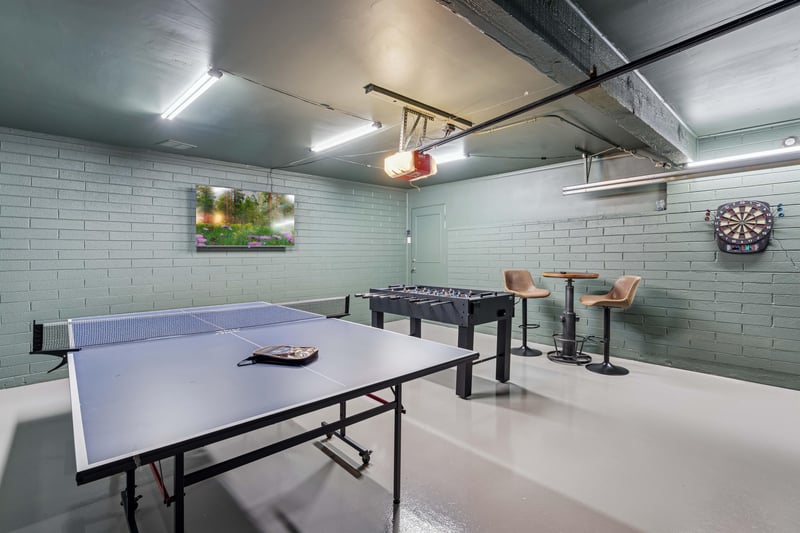 Watch your favorite show on the 85 inch flat screen TV while competing in a gave of ping pong, Foosball, and darts.