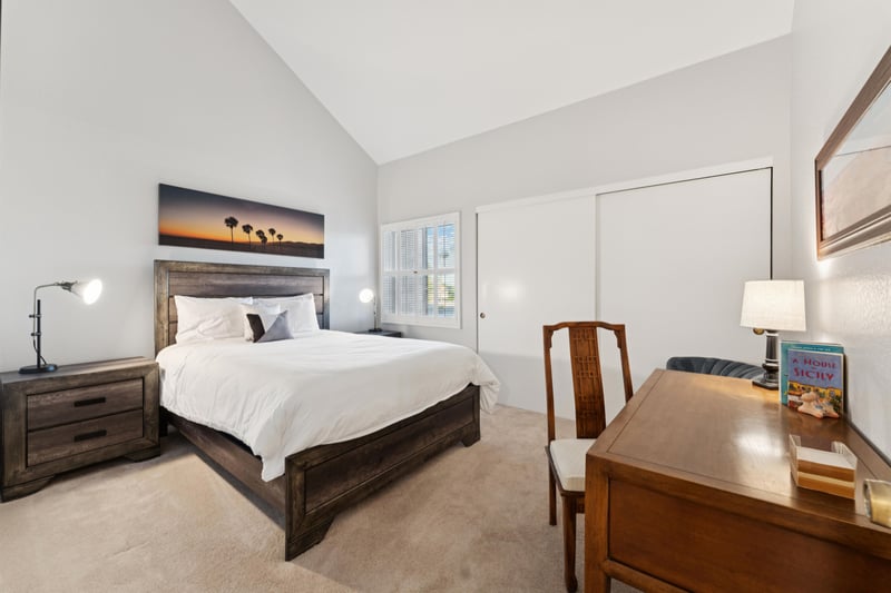 Guest bedroom 1 equipped with a desk and chair for those who work from home