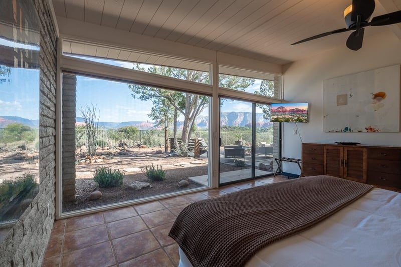 Master Bedroom WIth Wall To Wall Windows