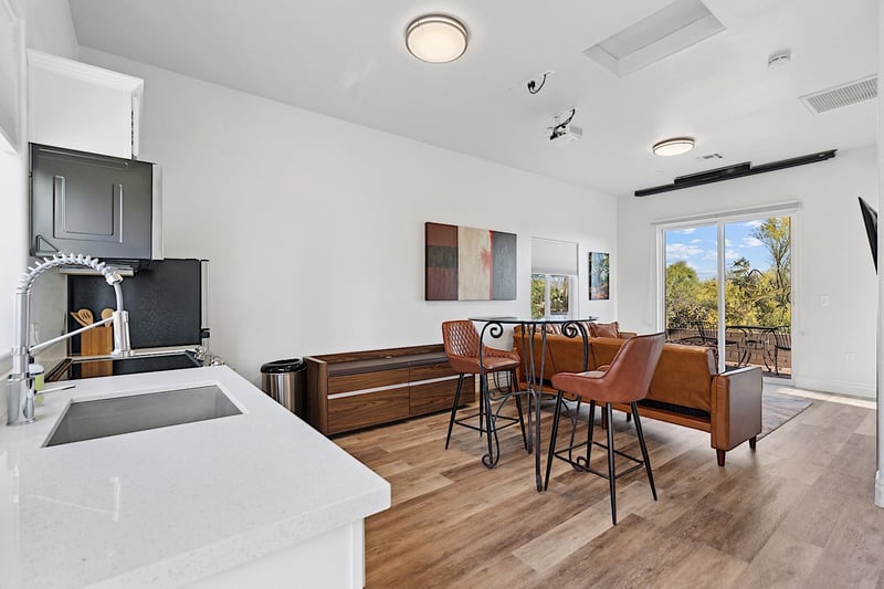 Inside of the guest house. Kitchen, dining area and living room