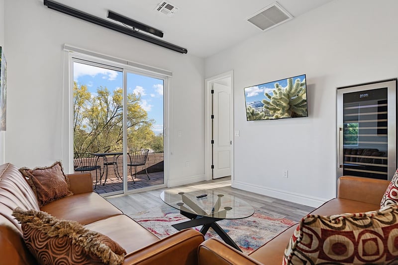 Living room of house  wine fridge on wall