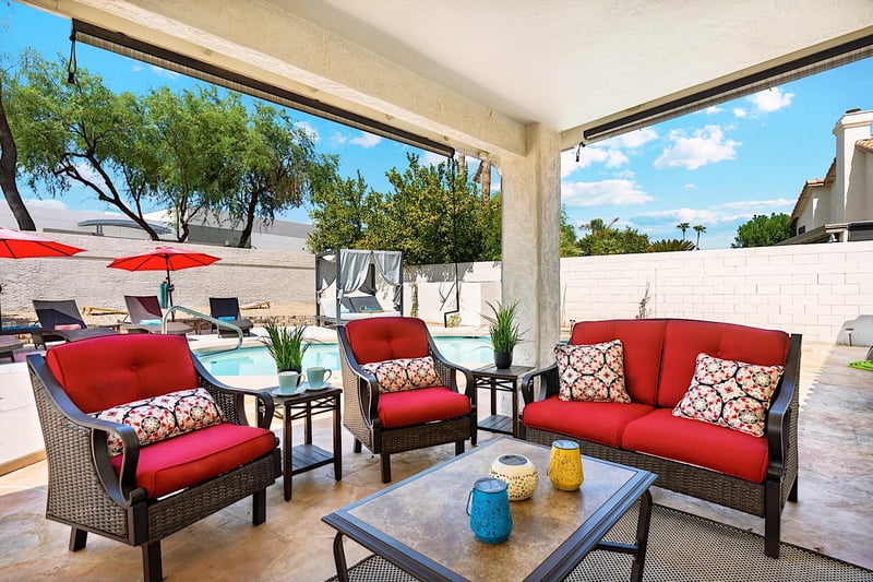 Covered patio  Conversation area w mounted Smart TV