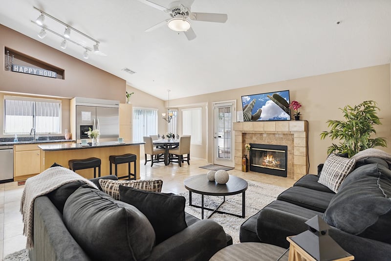 Living room  looking into kitchen and dining area.