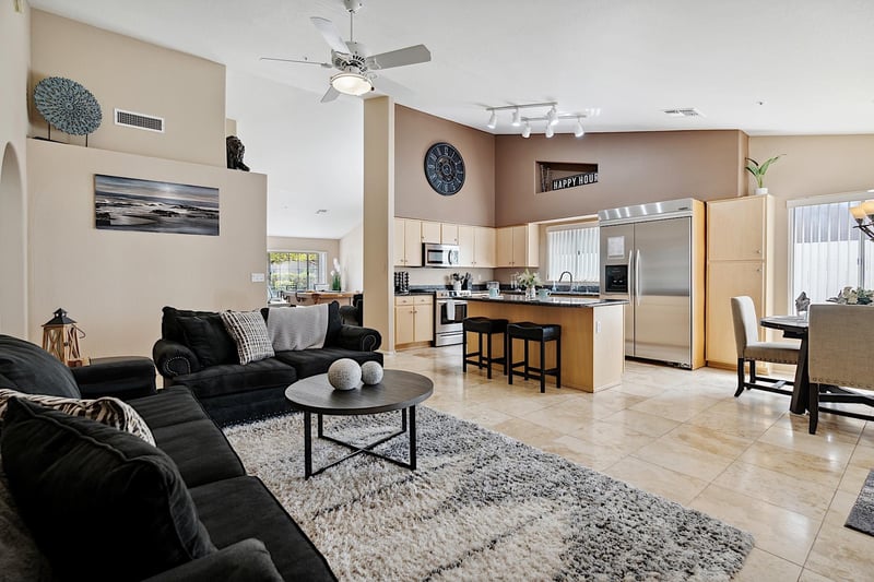 Living room  looking into kitchen and dining area.