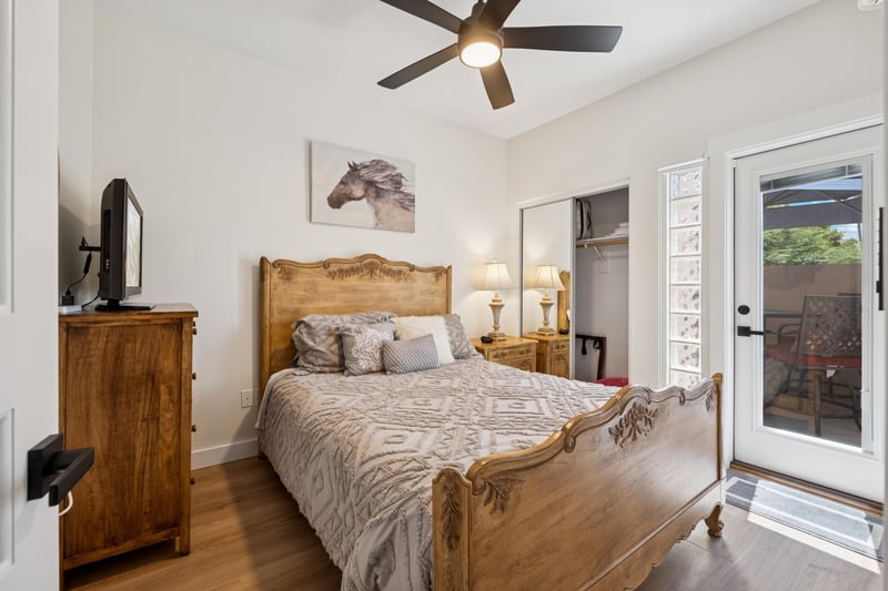 Upstairs guest bedroom with outside balcony