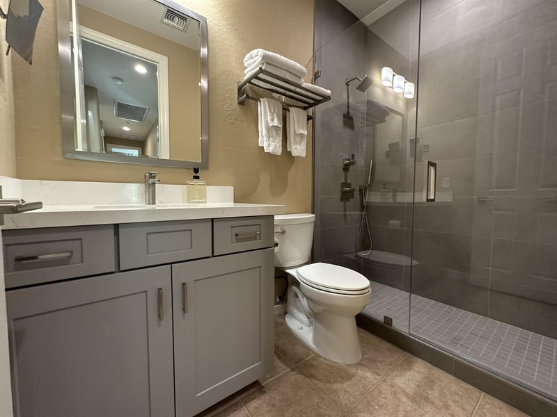 Spacious walkin shower.