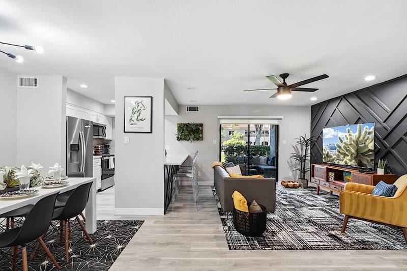 View of the layout Living room, breakfast bar, dining table and kitchen