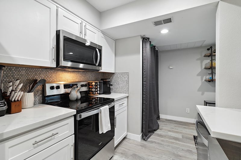 Kitchen looking into laundry room