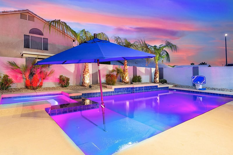 Pool lit up at night.