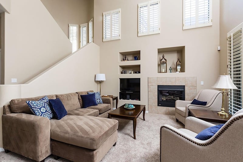 Plush sofa with chaise lounge, cable TV, and gas fireplace