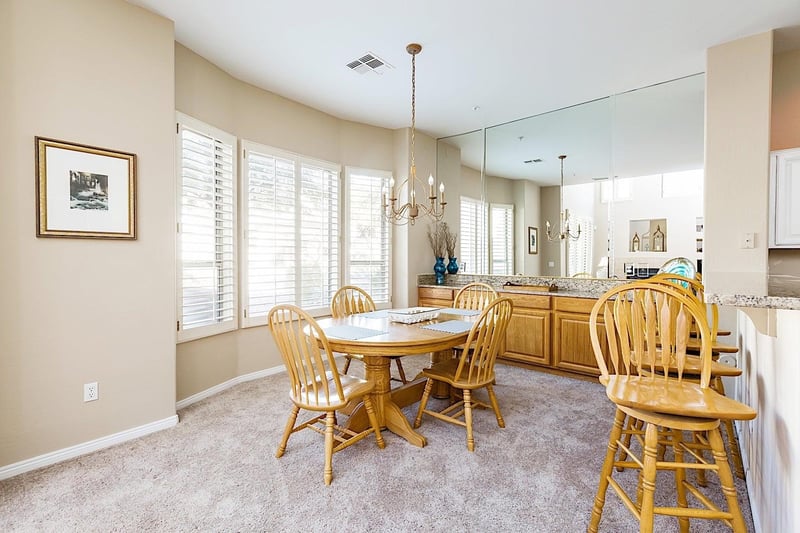 Dining table has room for 6 guests.  There is a leaf in the hall closet near front door