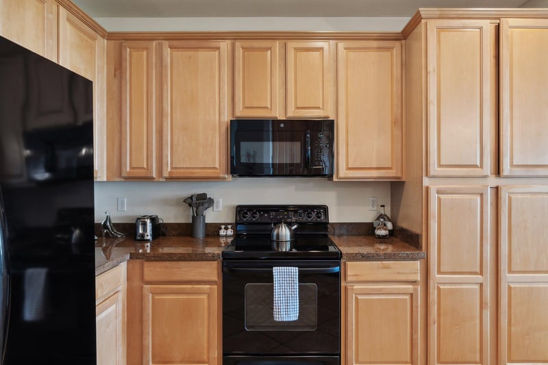 Electric stove and plenty of cabinets