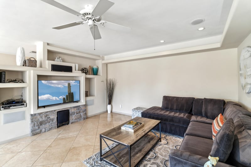 Enjoy the living room with a great couch that you can sink into. Large Flatscreen TV