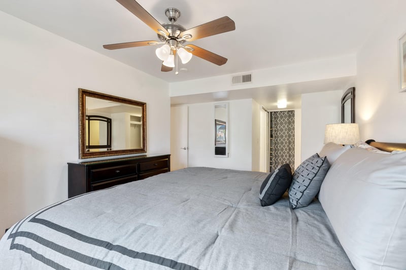 Main bedroom has a King bed for you to fall into, ceiling fan, and plenty of storage. Dont forget the ensuite bathroom