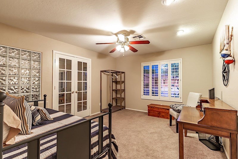 Office area with desk and trundle bed