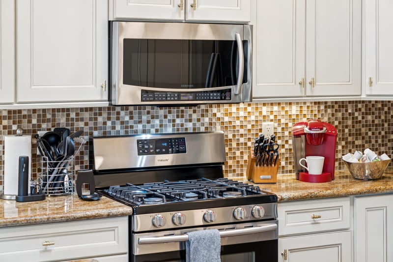 Modern stainless steel appliances for a sleek, gourmet touch