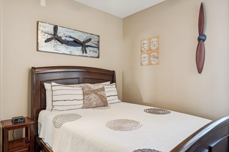 Charming guest bedroom featuring unique aviationinspired décor