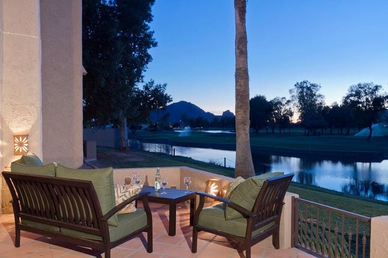 Expansive private patio overlooking the golf course and waterway. It is half covered for shade lovers and half open for sun worshippers.