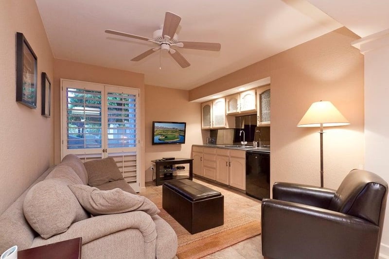 Separate cozy den  with TV and fold out sofa.