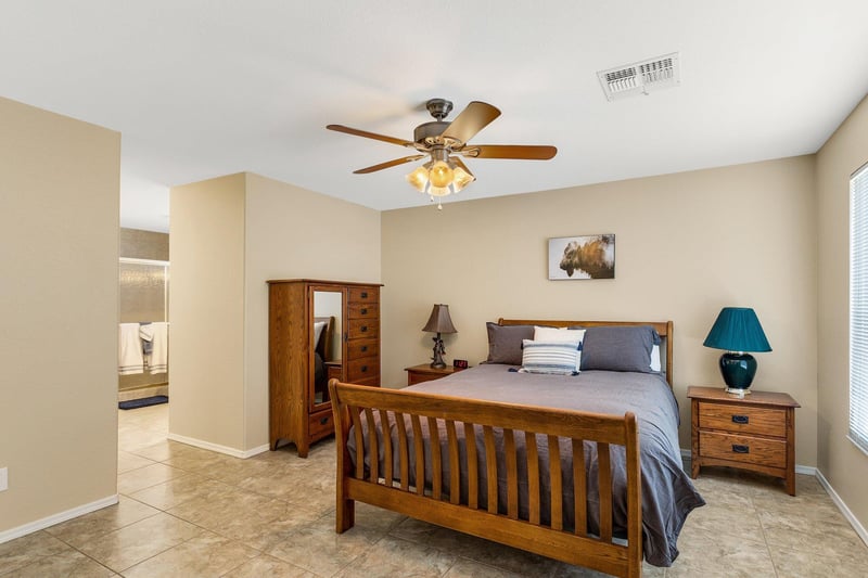 Master bedroom with view of entrance to master bathroom