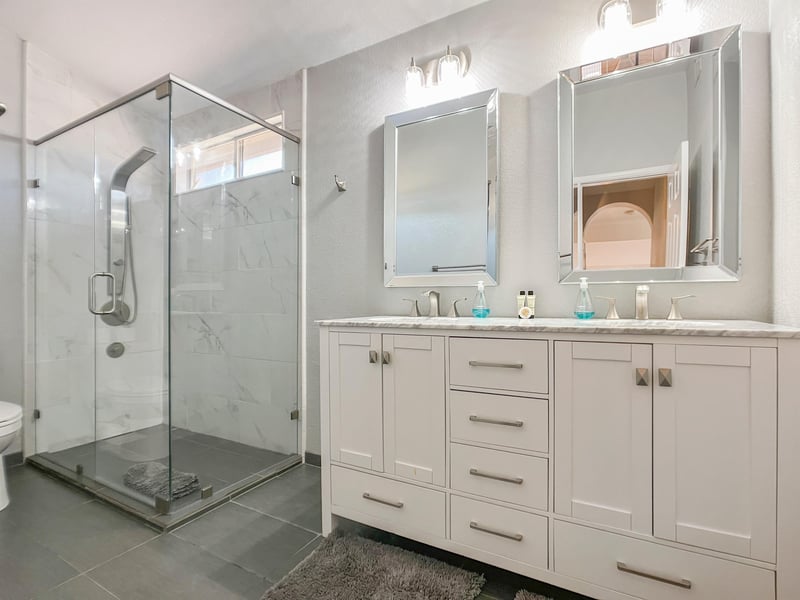 This bath is located upstairs near the study loft and two  of three bedrooms.