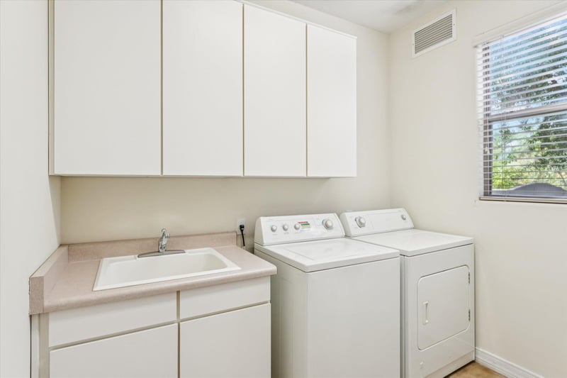 Laundry Room with Full Sized WasherDryer