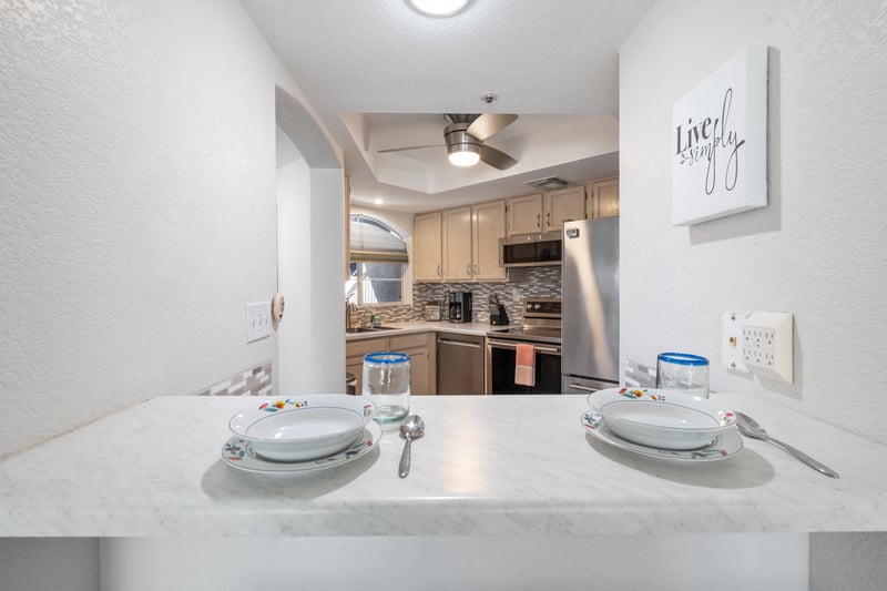 Enjoy breakfast for 2 at the countertop dining area.