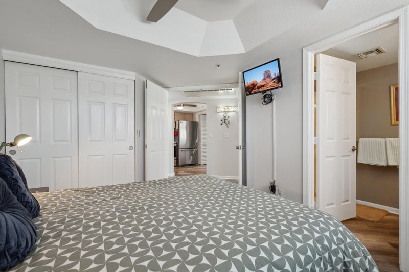 En suite bathroom and a flat screen smart television.