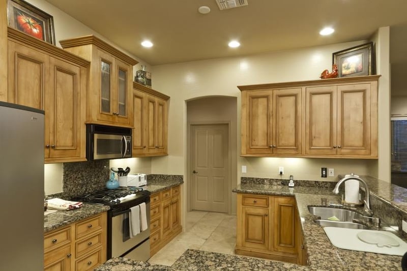 Lots of counter space surrounding stainless steel appliances